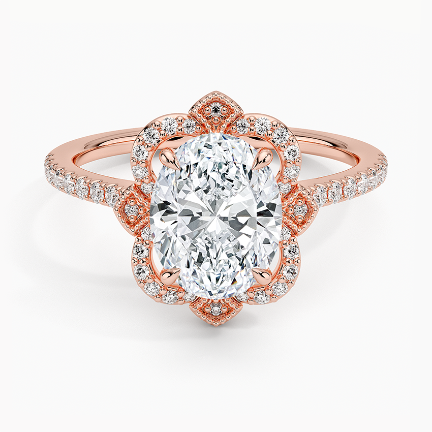 Oval moissanite in a scalloped floral halo in rose gold, top view