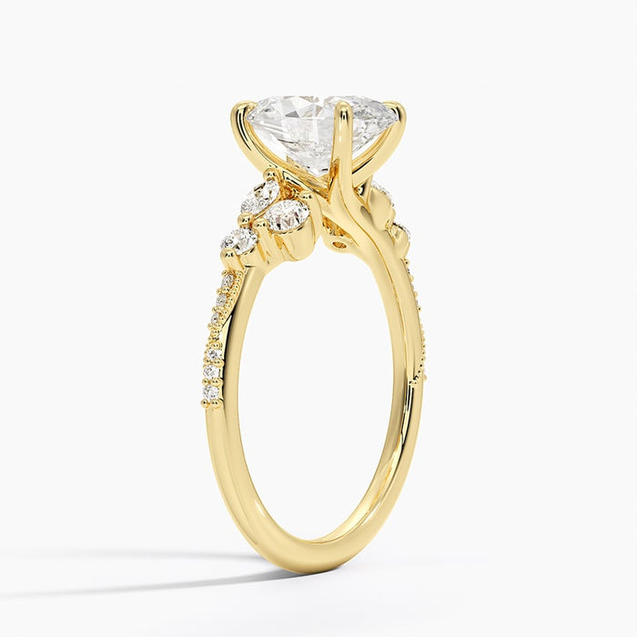 Side view showing the graduated cluster and milgrain edged pave shoulder