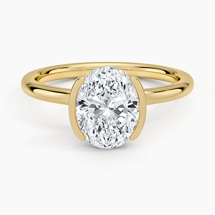 Oval moissanite in a half bezel open frame in yellow gold, top view