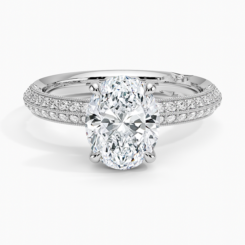 Oval moissanite on a knife edge double row pave band in white gold, top view