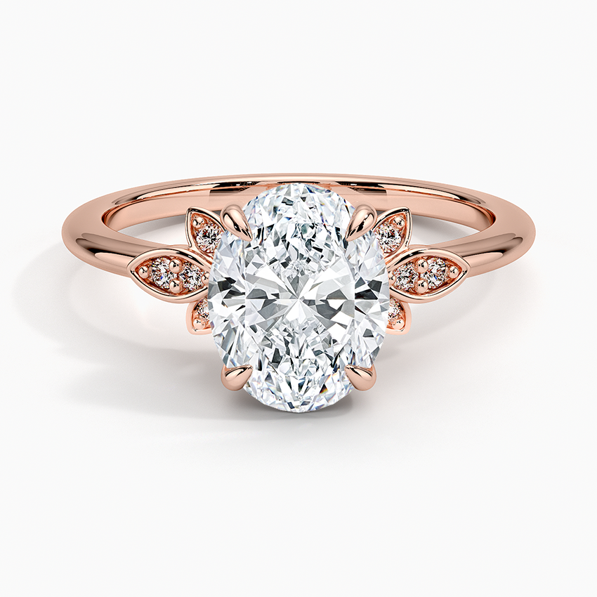 Oval moissanite with marquise leaf clusters in rose gold, top view