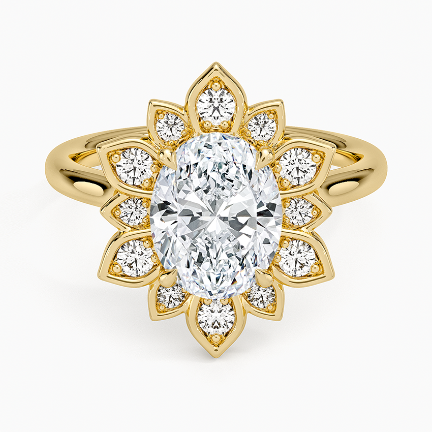 Oval moissanite inside a yellow gold petal halo with a round accent in each petal, top view