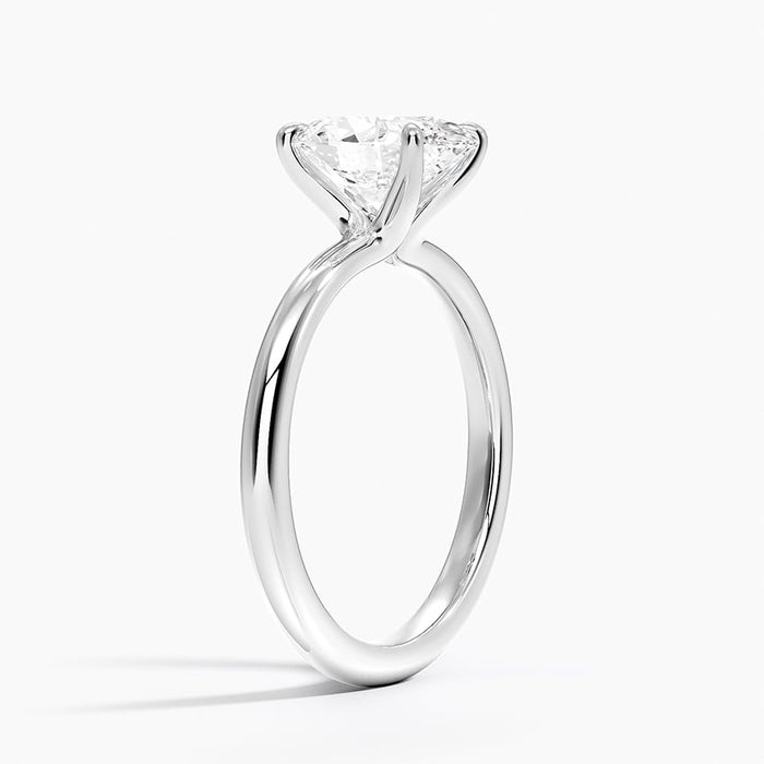 Side view showing the low setting with prongs rising straight from the band