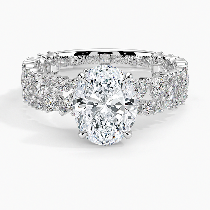 Oval moissanite on a wide marquise cluster band in white gold, top view