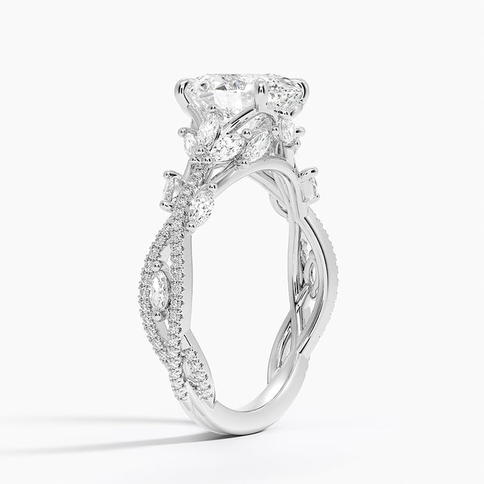 Side profile showing the twisted pave vine shank and marquise leaf accents