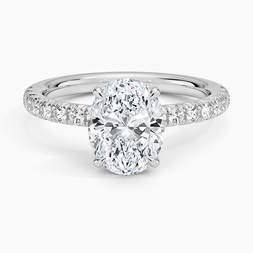 Oval moissanite scalloped pave solitaire engagement ring in white gold, top view