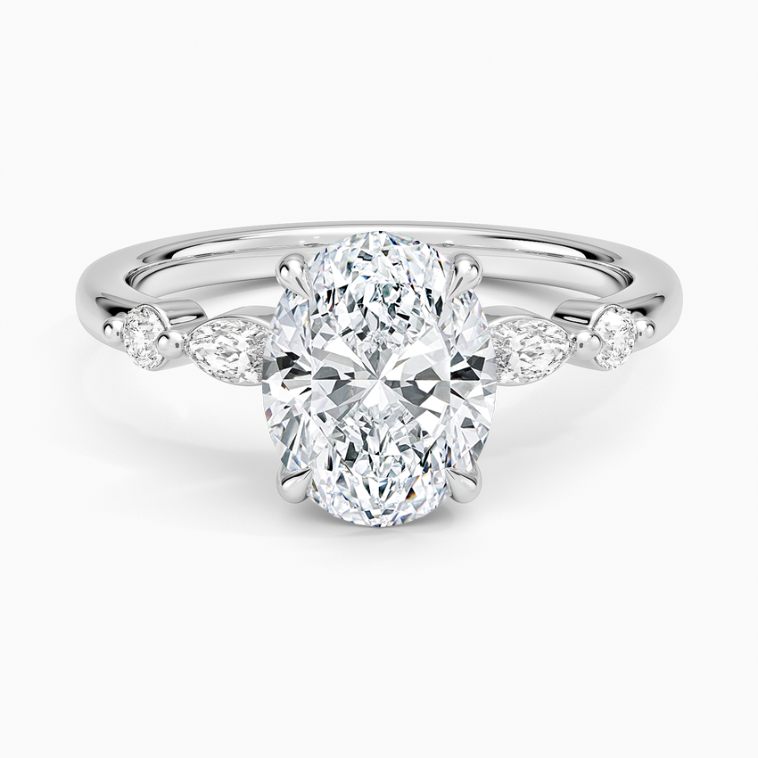 Oval moissanite with spaced marquise and round accents in white gold, top view