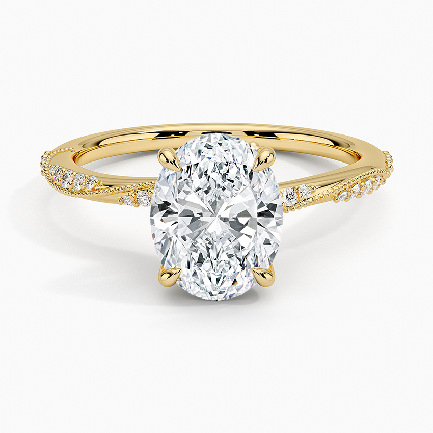 Oval moissanite twisted pave and milgrain engagement ring in yellow gold, top view