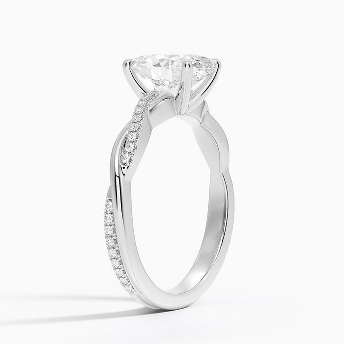 Side profile of oval moissanite ring showing the two twisted strands and pave