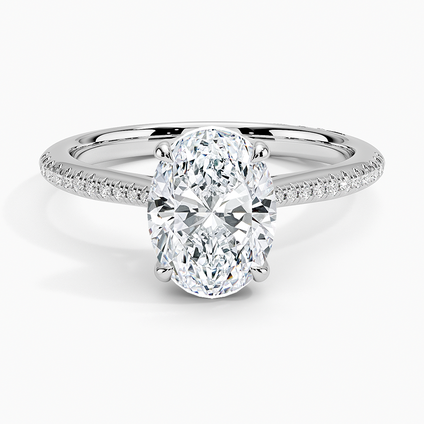 Oval moissanite on an ultra fine micropave band in white gold, top view