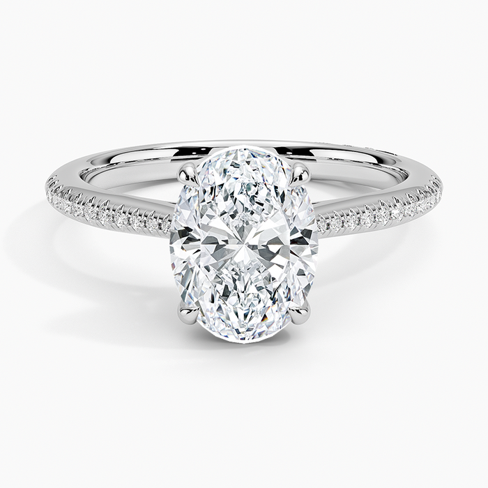 Oval moissanite on an ultra fine micropave band in white gold, top view