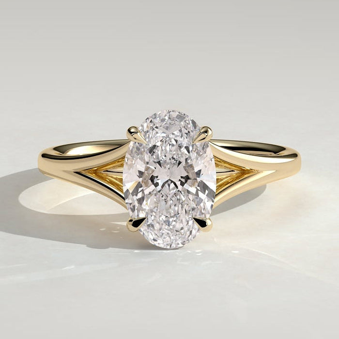 Oval cut moissanite V split shank solitaire engagement ring in yellow gold