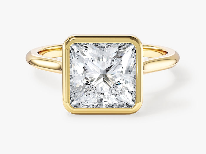 Large princess cut lab grown diamond bezel statement engagement ring in yellow gold, front view