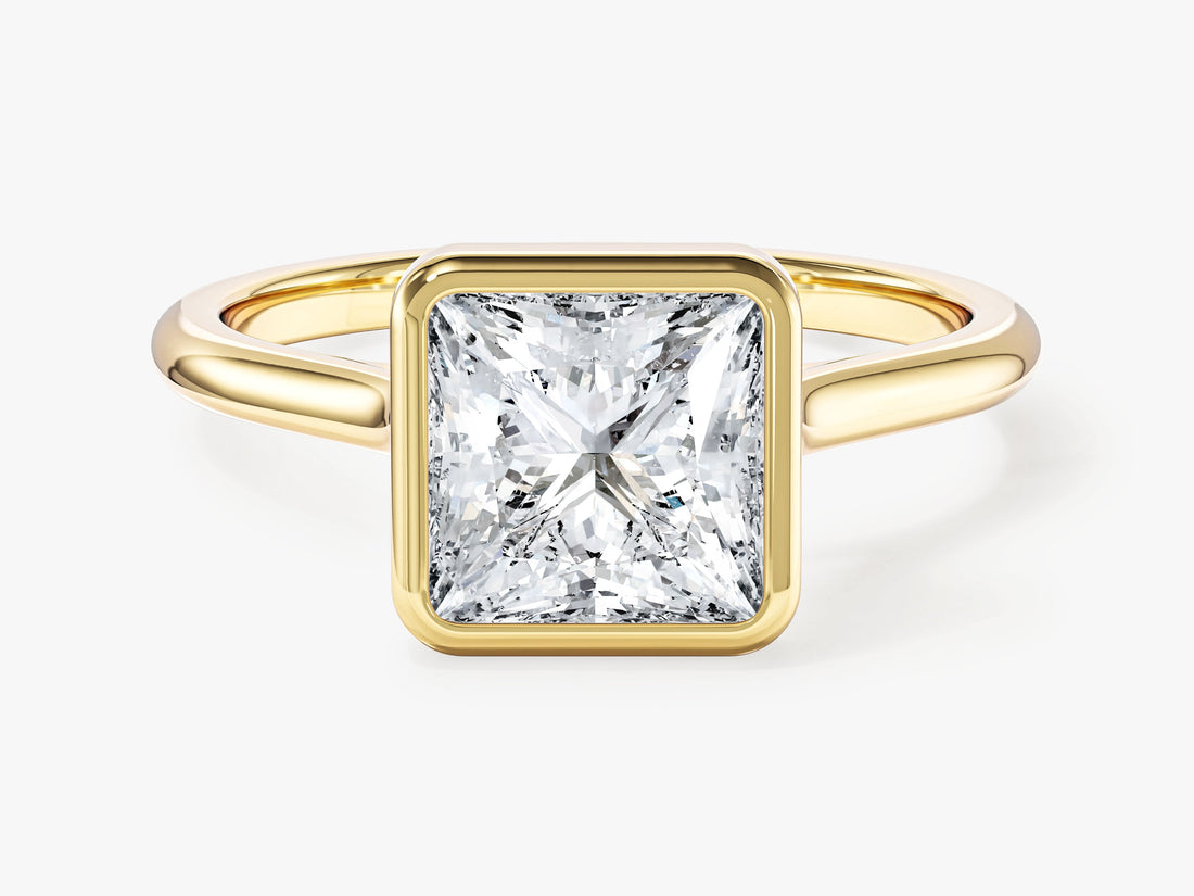 Modern square princess moissanite bezel solitaire engagement ring in yellow gold, front view