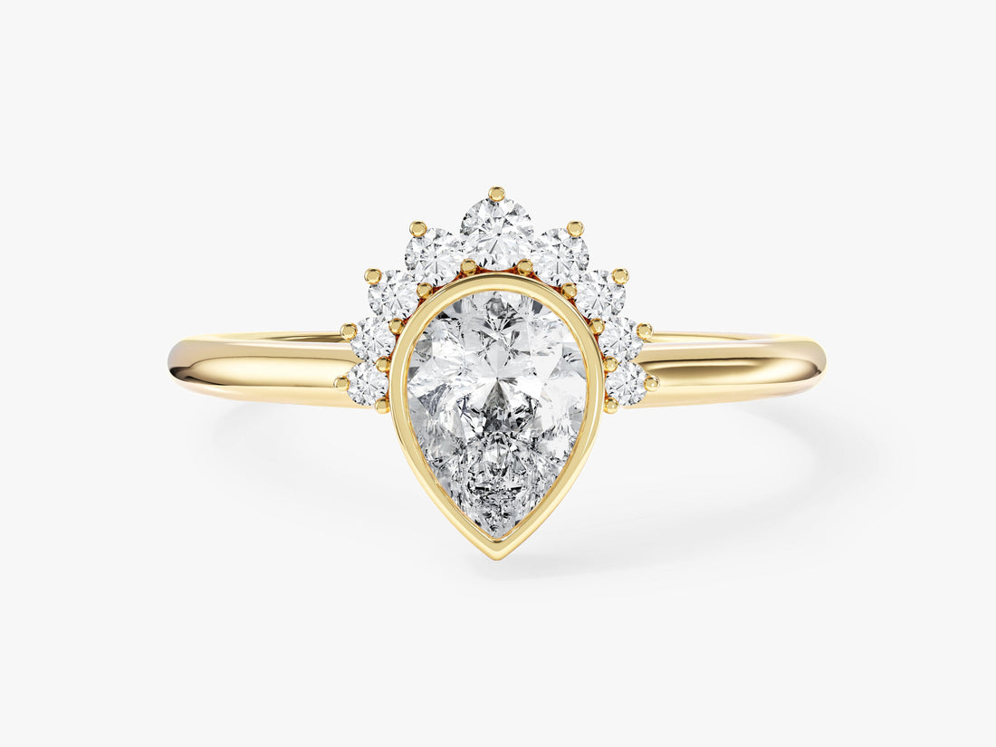 Pear cut moissanite crown halo engagement ring with bezel setting in 14K yellow gold, front view