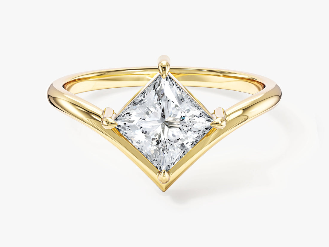 Kite set princess cut moissanite chevron V band engagement ring in yellow gold, front view