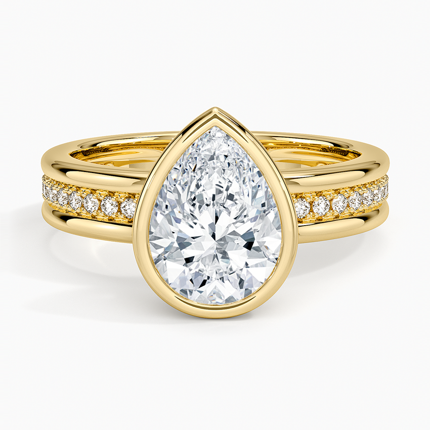 Bezel set pear cut moissanite ring with channel pave rail band, top view