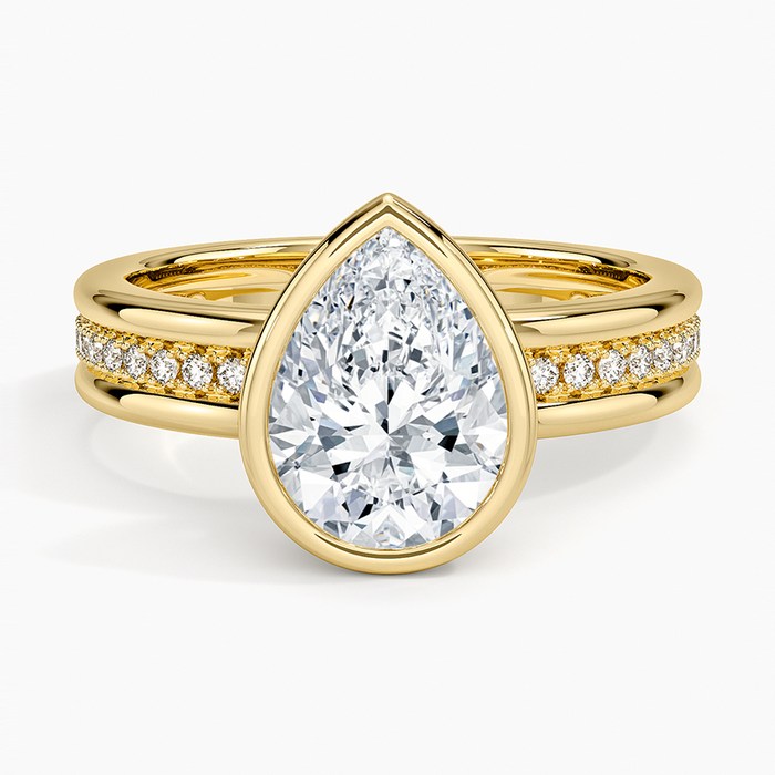 Bezel set pear cut moissanite ring with channel pave rail band, top view