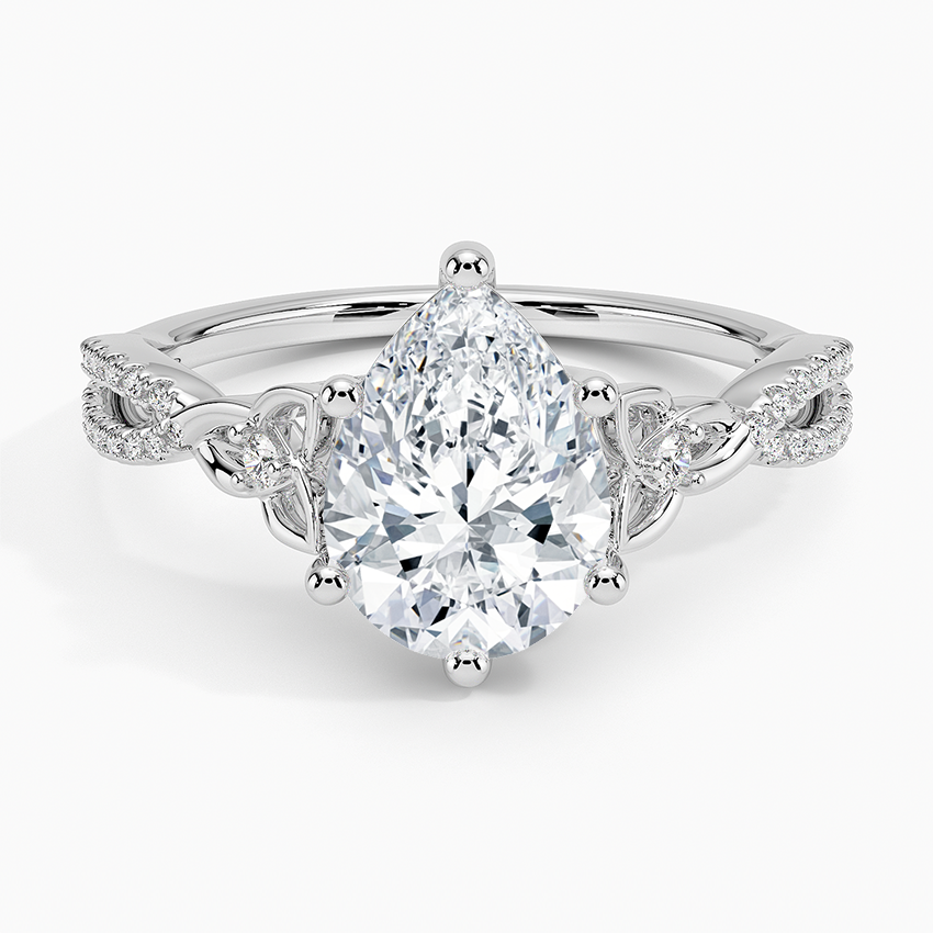 Pear cut moissanite Celtic knot pave engagement ring in white gold, top view