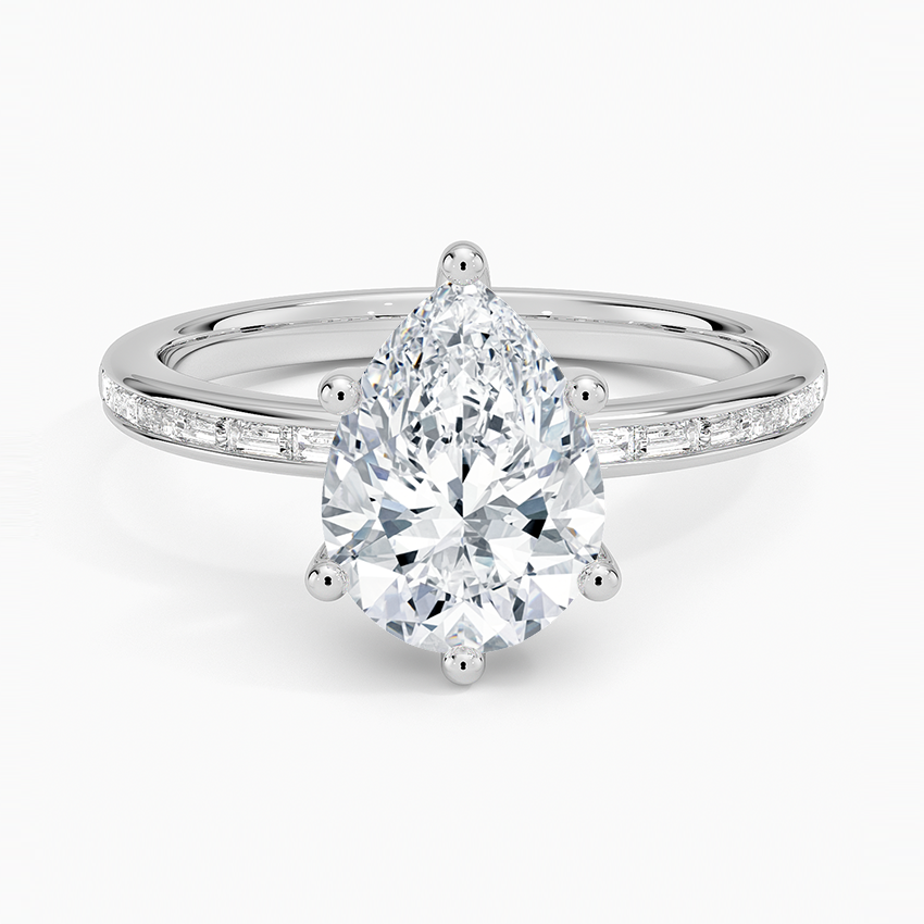 Pear cut moissanite channel set baguette engagement ring in white gold, top view