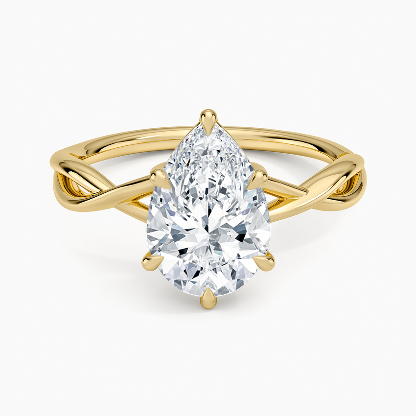Pear cut moissanite entwined vine solitaire engagement ring in yellow gold, top view