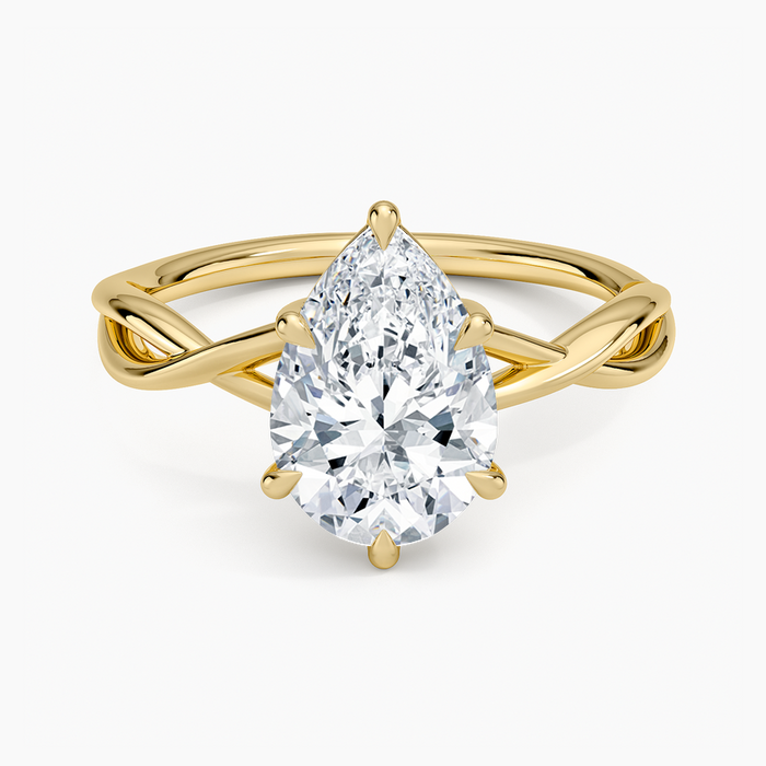 Pear cut moissanite entwined vine solitaire engagement ring in yellow gold, top view