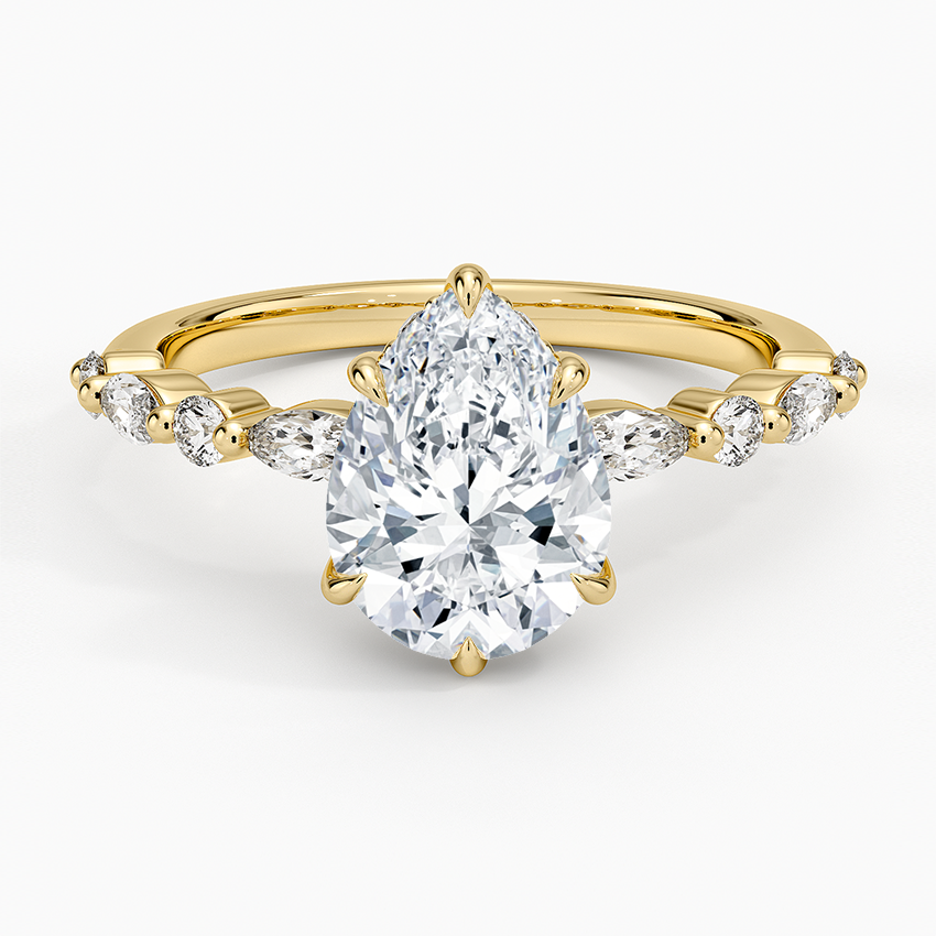 Pear cut moissanite with alternating marquise and round accents in yellow gold, top view
