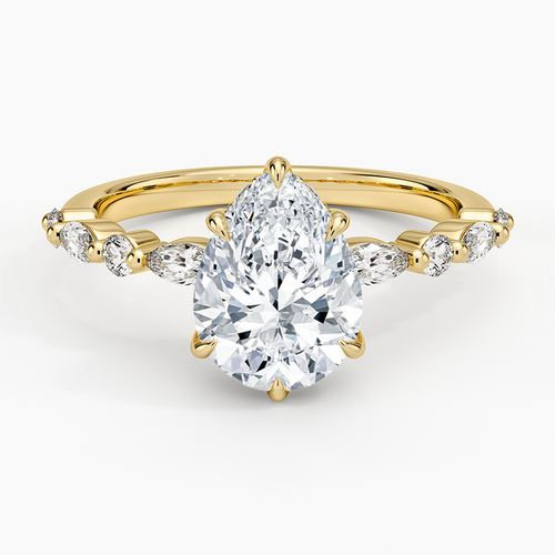 Pear cut moissanite with alternating marquise and round accents in yellow gold, top view