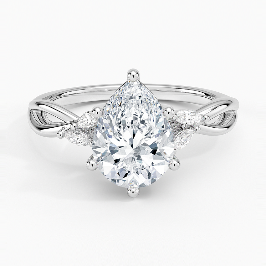 Pear cut moissanite on an infinity crossover shank with marquise petal accents in white gold, top view