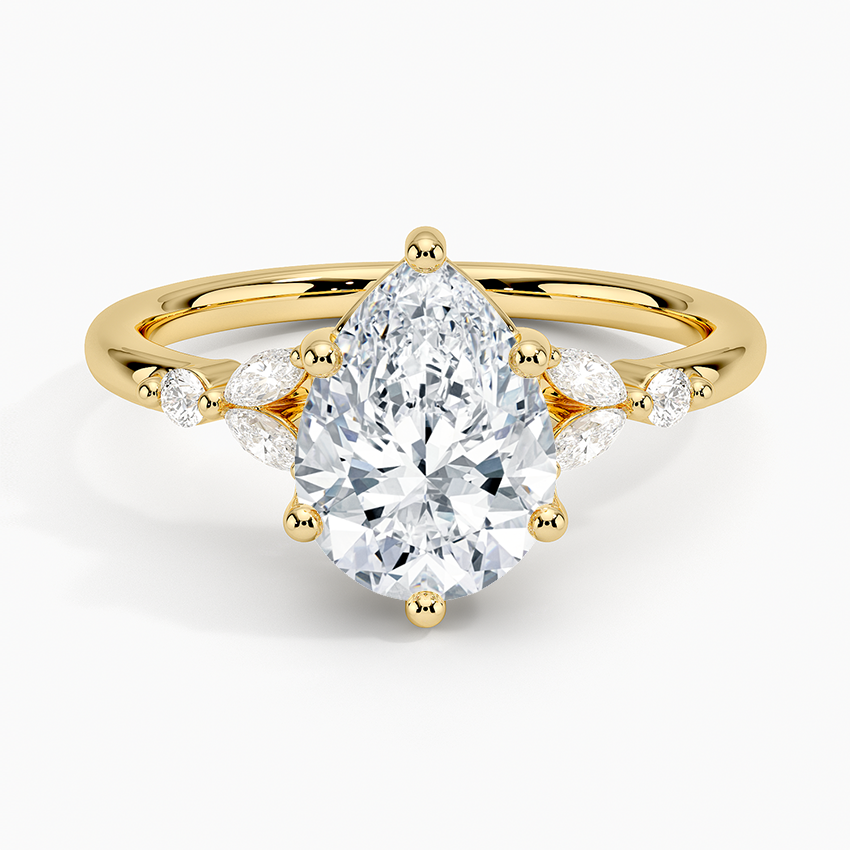 Pear cut moissanite marquise petal fan engagement ring in yellow gold, top view