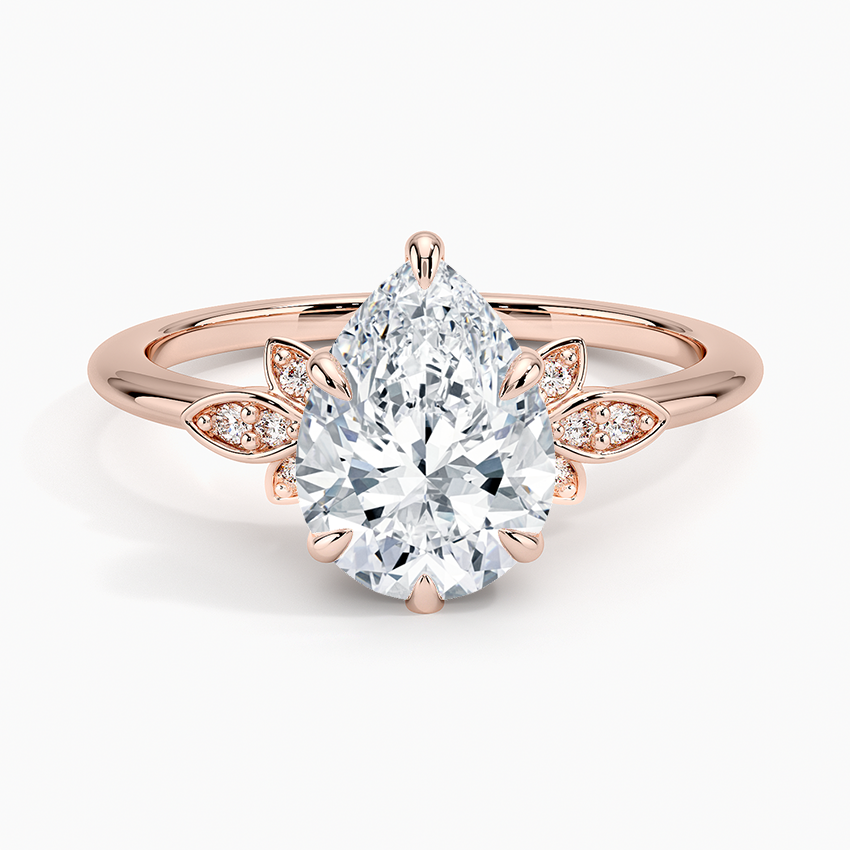 Pear cut moissanite petal pave fan engagement ring in rose gold, top view