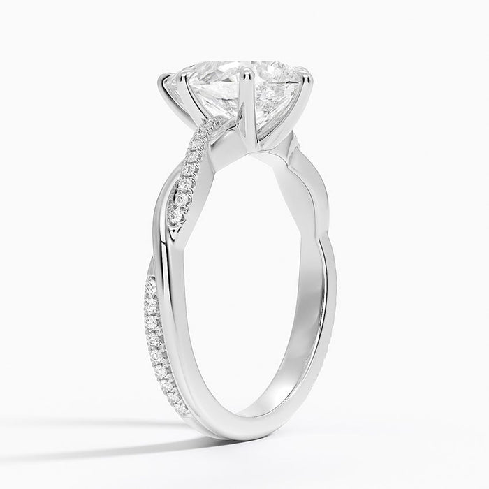 Side view showing the two twisting strands, one pave set and one polished