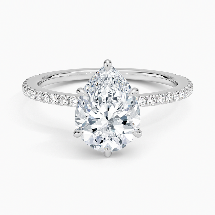 Pear cut moissanite scalloped pave hidden halo engagement ring in white gold, top view