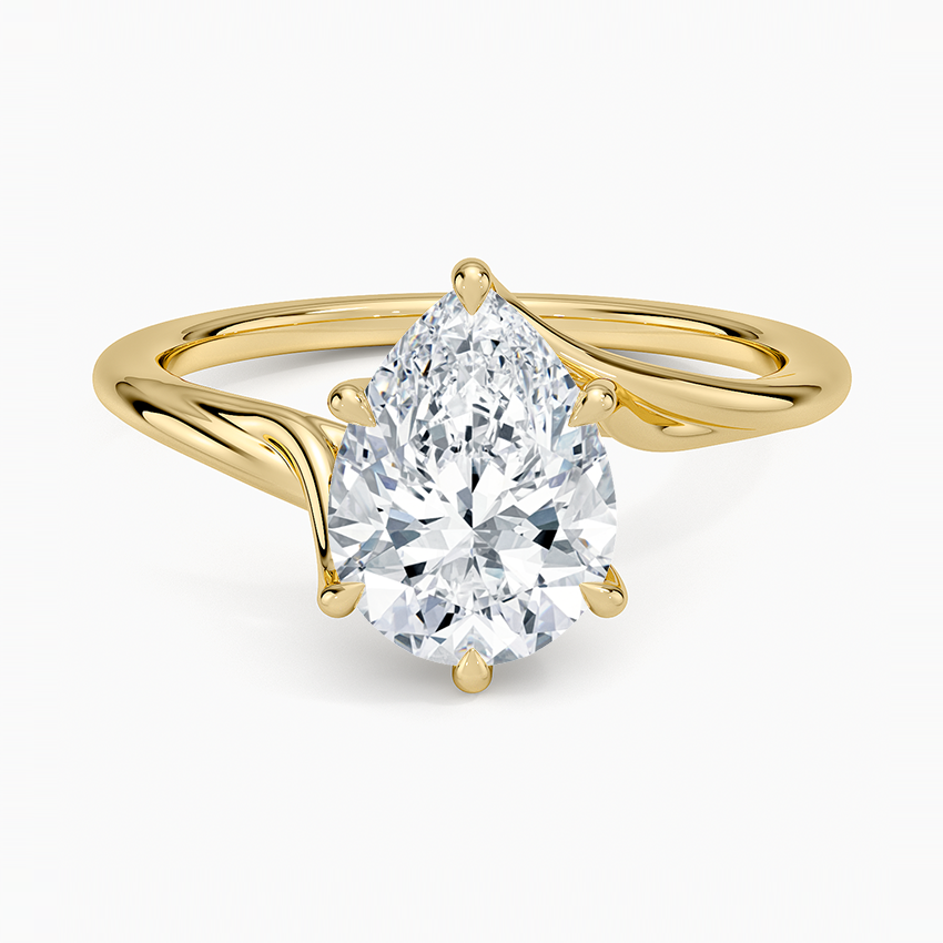 Pear cut moissanite sculpted bypass solitaire engagement ring in yellow gold, top view