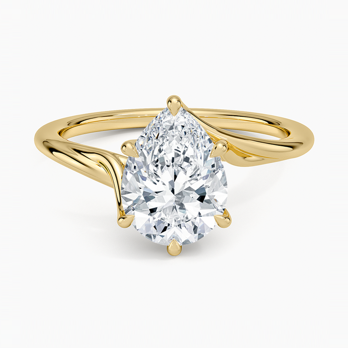Pear cut moissanite sculpted bypass solitaire engagement ring in yellow gold, top view