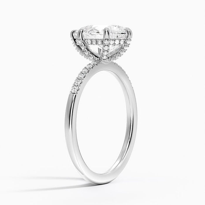 Side view showing the hidden halo under the pear and the narrow tapering band