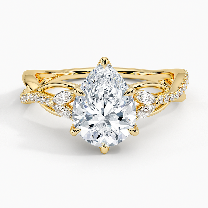 Pear cut moissanite split shank vine engagement ring in yellow gold, top view