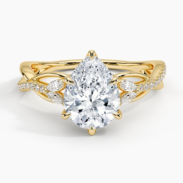 Pear cut moissanite split shank vine engagement ring in yellow gold, top view