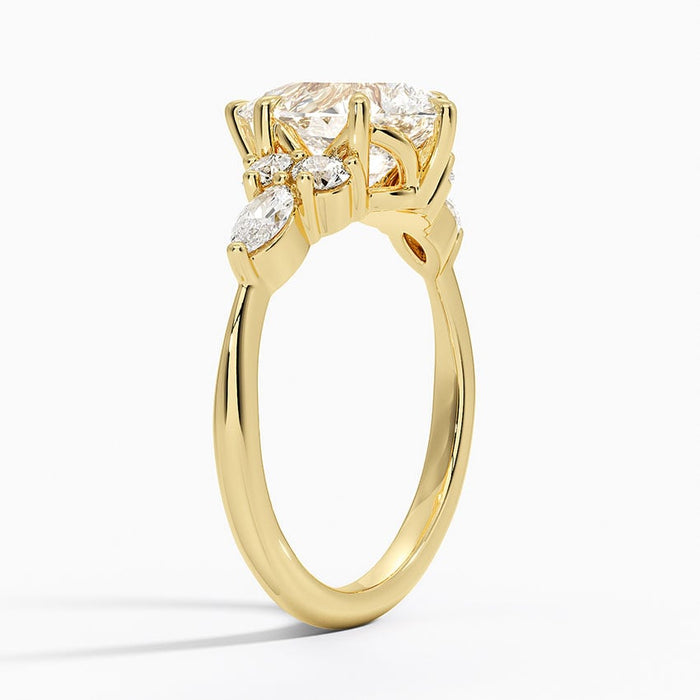 Side view showing the three accent stones per shoulder and the slim tapering band