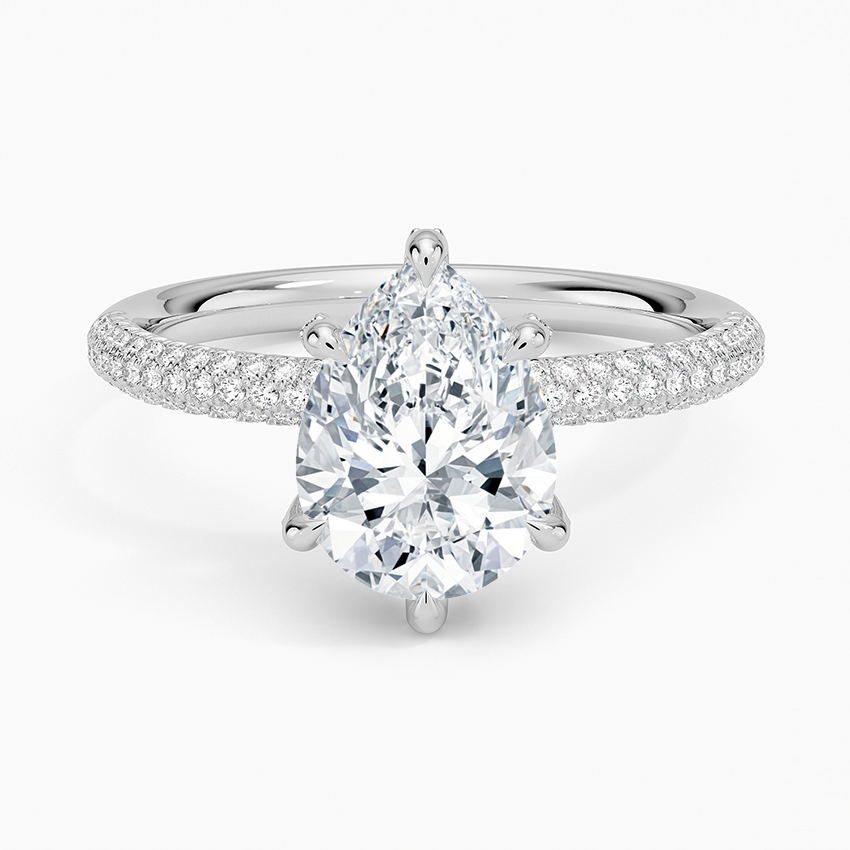 Pear cut moissanite three sided pave engagement ring in white gold, top view