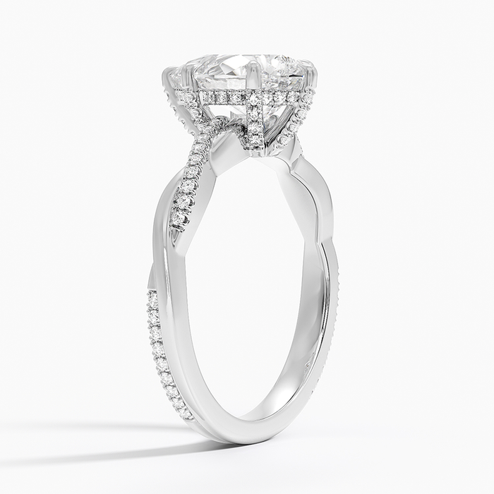 Side view showing the hidden halo and pave carried up into the gallery