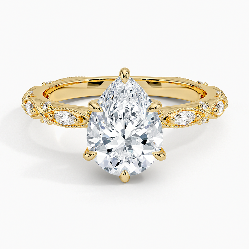 Pear cut moissanite vintage milgrain marquise band engagement ring in yellow gold, top view
