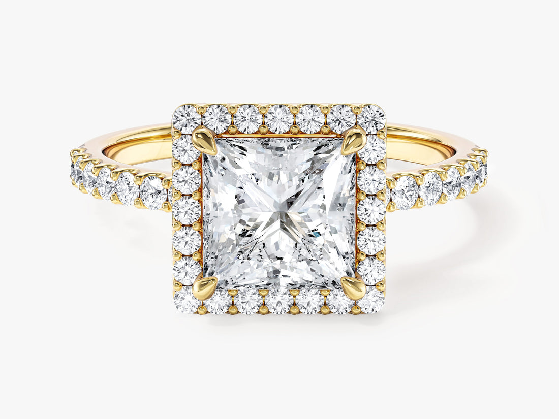 Princess moissanite micro pave halo engagement ring with accent stone band in 14K yellow gold, front view