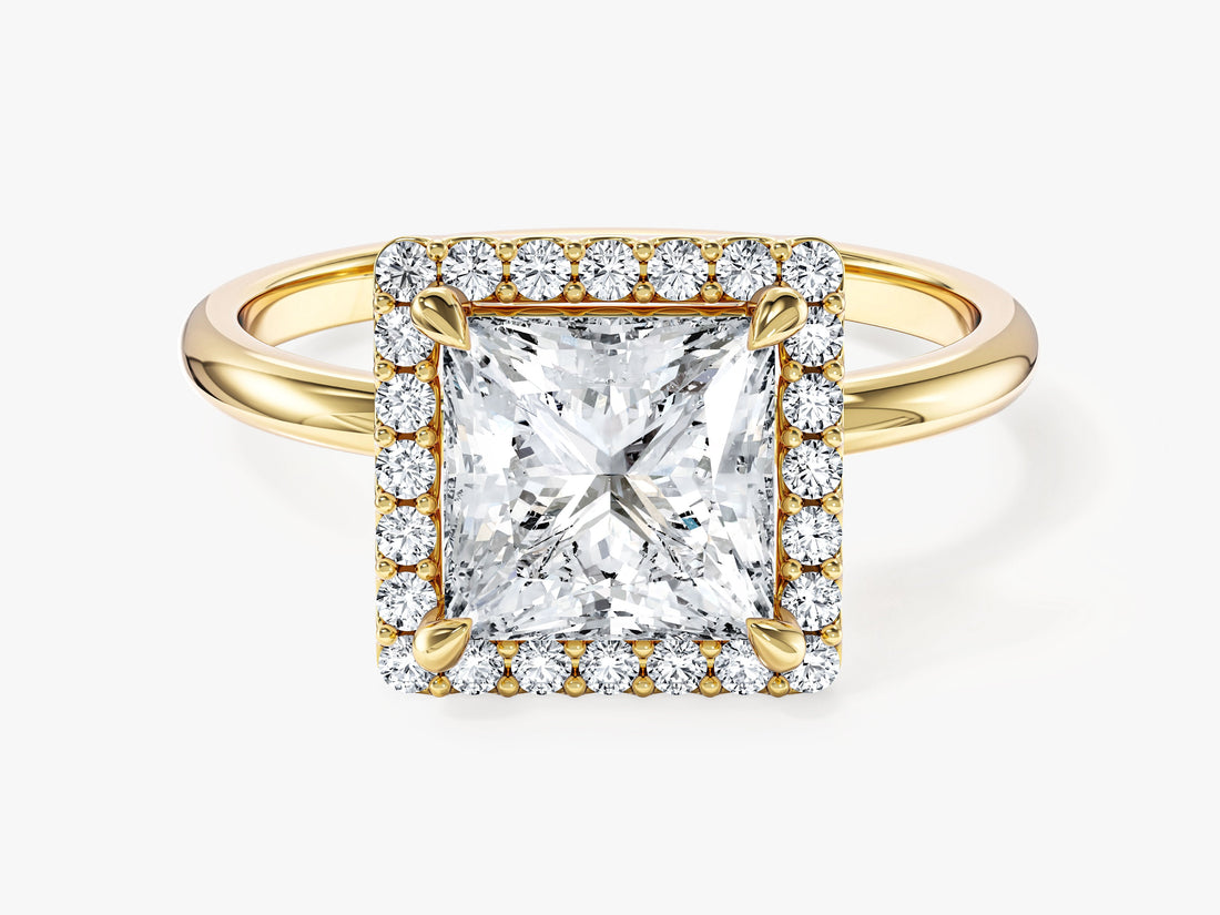 Princess cut moissanite halo engagement ring with plain band in 14K yellow gold, front view