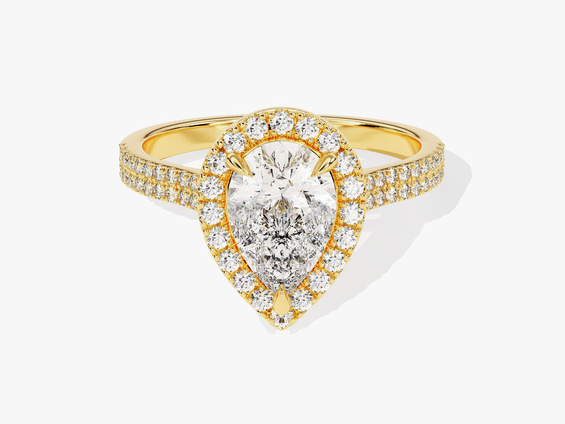 Teardrop pear lab grown diamond halo engagement ring with two row pave shank in yellow gold, front view