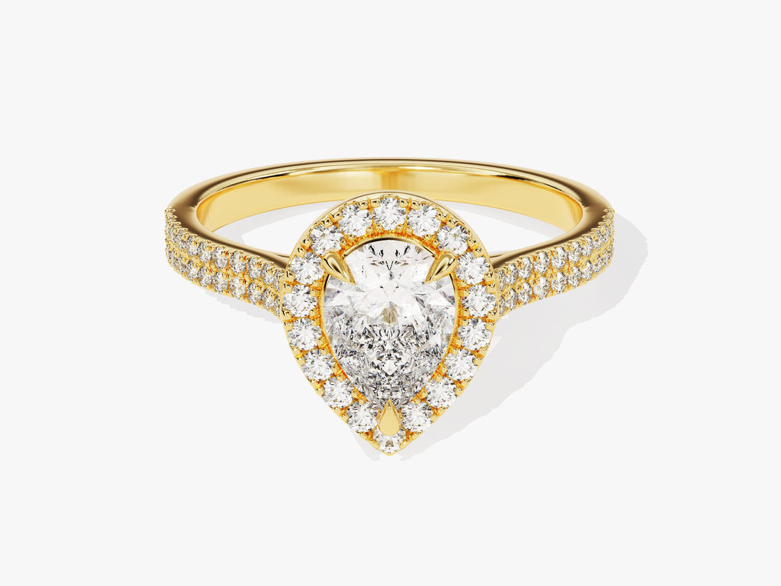 Pear cut lab grown diamond pave halo engagement ring with double pave band in yellow gold, front angle