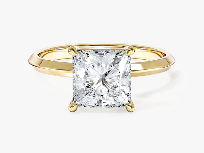 Princess cut lab grown diamond knife edge solitaire engagement ring in yellow gold, front view