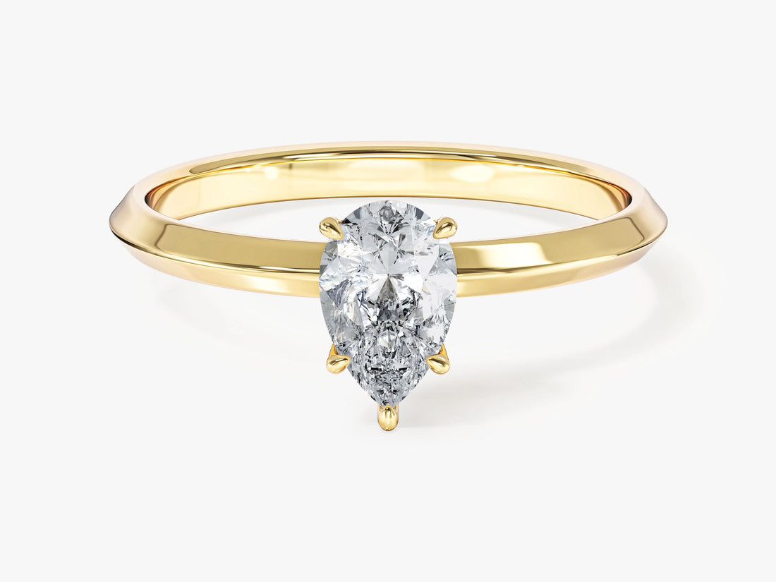 Teardrop pear cut lab grown diamond solitaire with knife edge band in yellow gold, front view