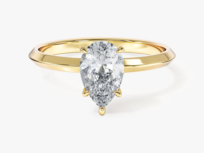 Pear shaped lab grown diamond engagement ring with knife edge band in yellow gold, front view