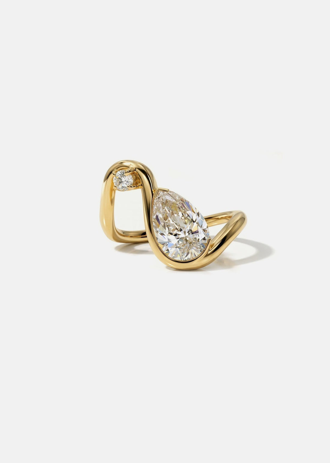 Pear and round moissanite open loop two stone engagement ring in yellow gold